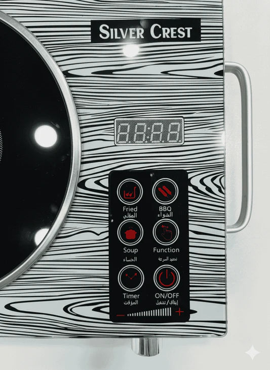 Silver Crest electric stove with digital display and control panel on a white background