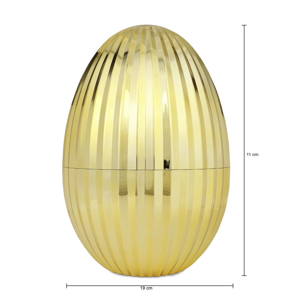 Gold egg-shaped object with dimensions