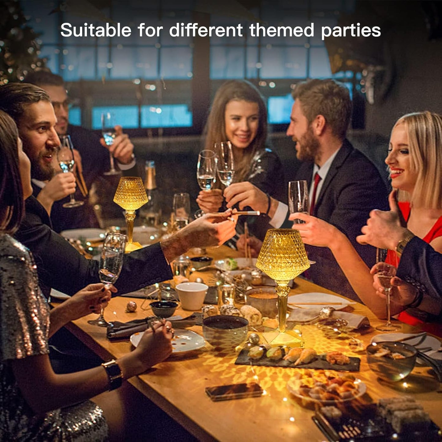 Group of people enjoying a dinner party with wine glasses and appetizers.