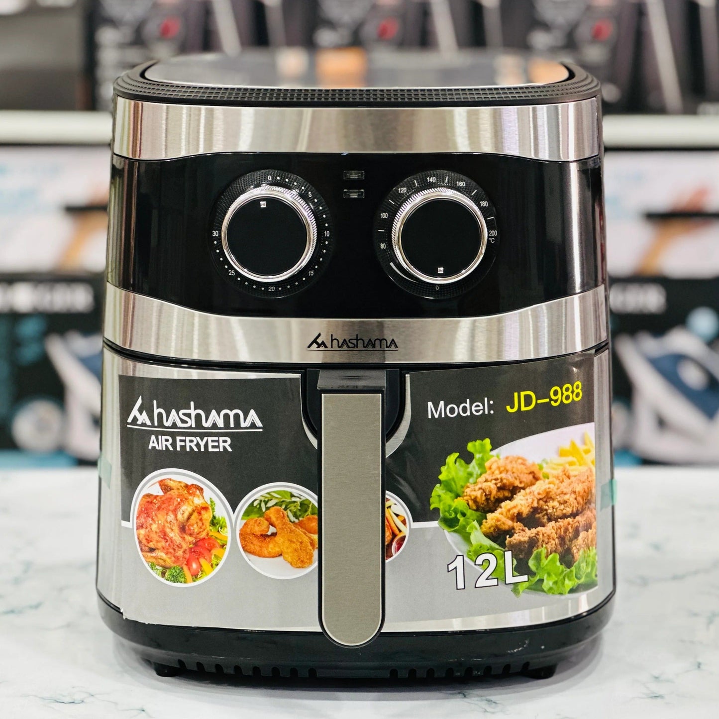 Hashama air fryer with food images on a marble surface