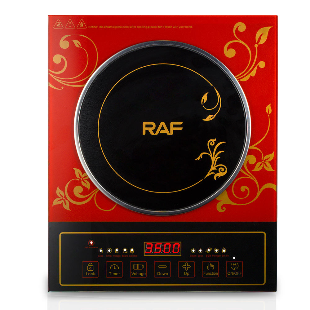 Induction cooktop with RAF branding on a red and gold decorative background
