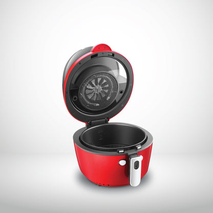 Red and black air fryer on a light gray background