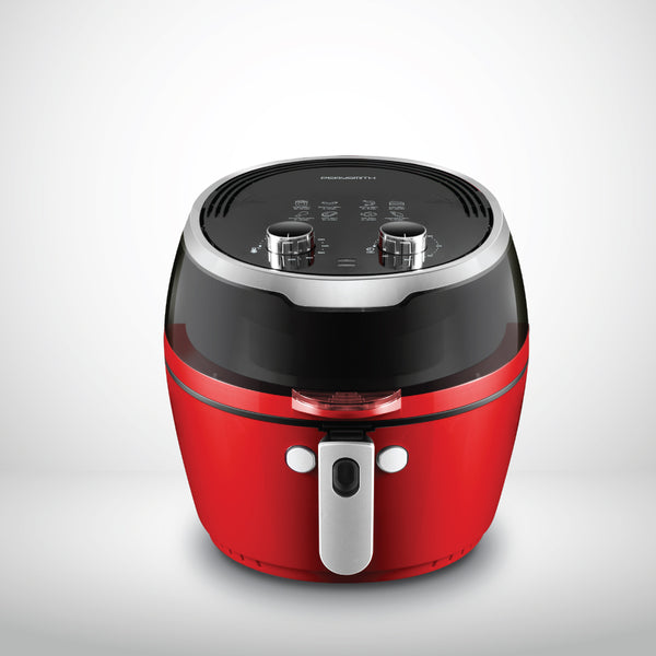 Red and black air fryer on a white background