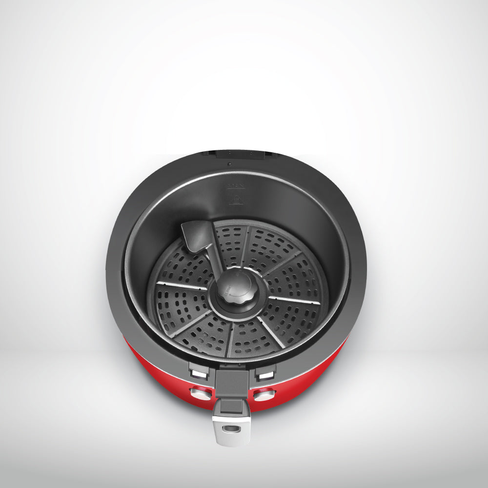 Red and black portable stove on a light gray background