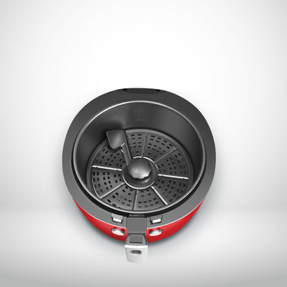 Red and black portable stove on a light gray background